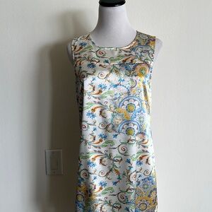 Woman’s dress is Edele fado size 44 maxi white pink